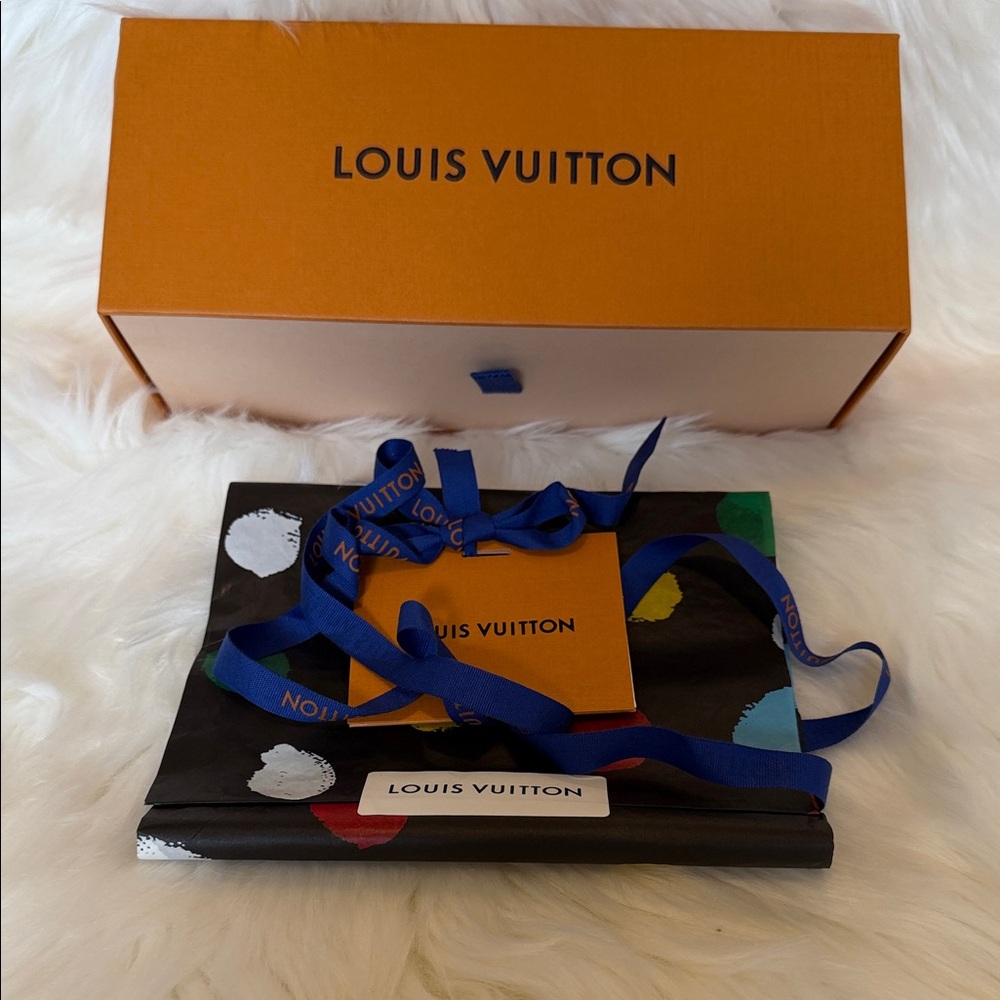 Louis Vuitton Orange Box with Blue Ribbon and tissue.